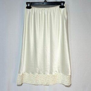 Womans gorgeous slip skirt with lace trim Size medium Off white
